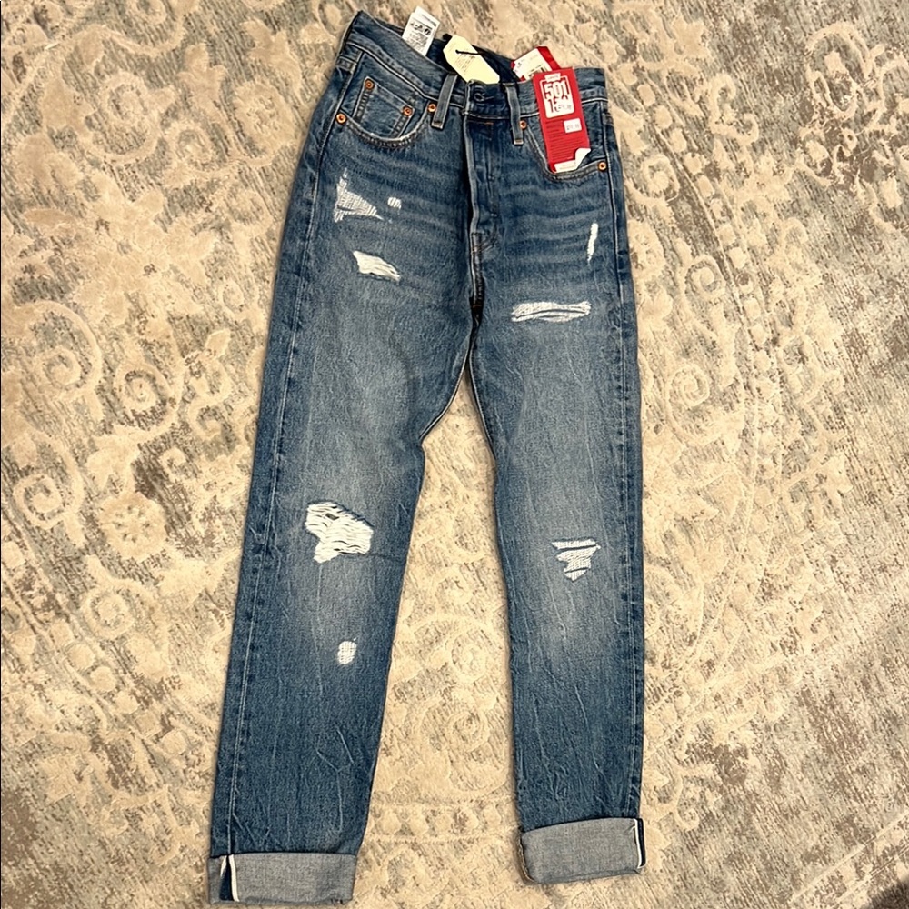 Distressed Blue Jeans